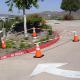 orange and white traffic cone bar safety barrier
