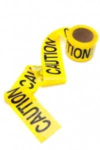 a roll of yellow caution tape