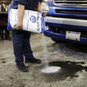Using Gran-Sorb to absorb a vehicle fluid spill