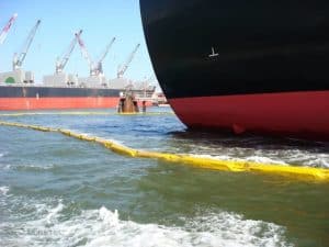 oil containment boom near ship