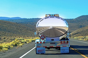 Tanker truck driving on road