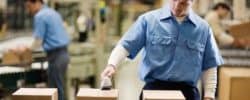 worker standing on the assembly line