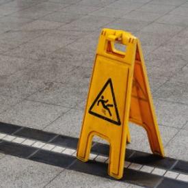slippery floor hazard sign