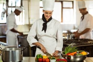 chef prepping food in the kitchen