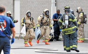 Emergency service response at workplace chemical spill